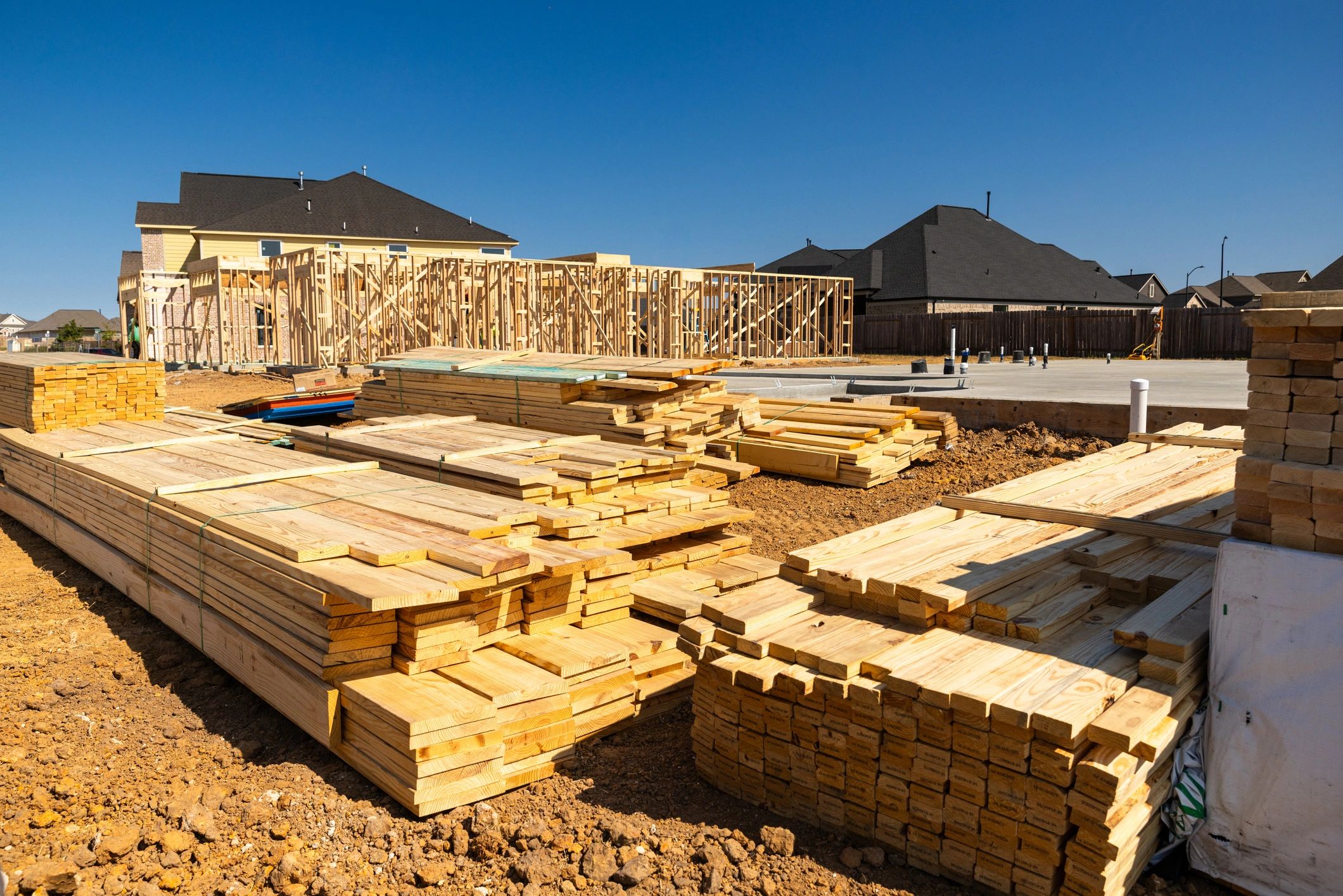 New custom home framing and foundation under construction