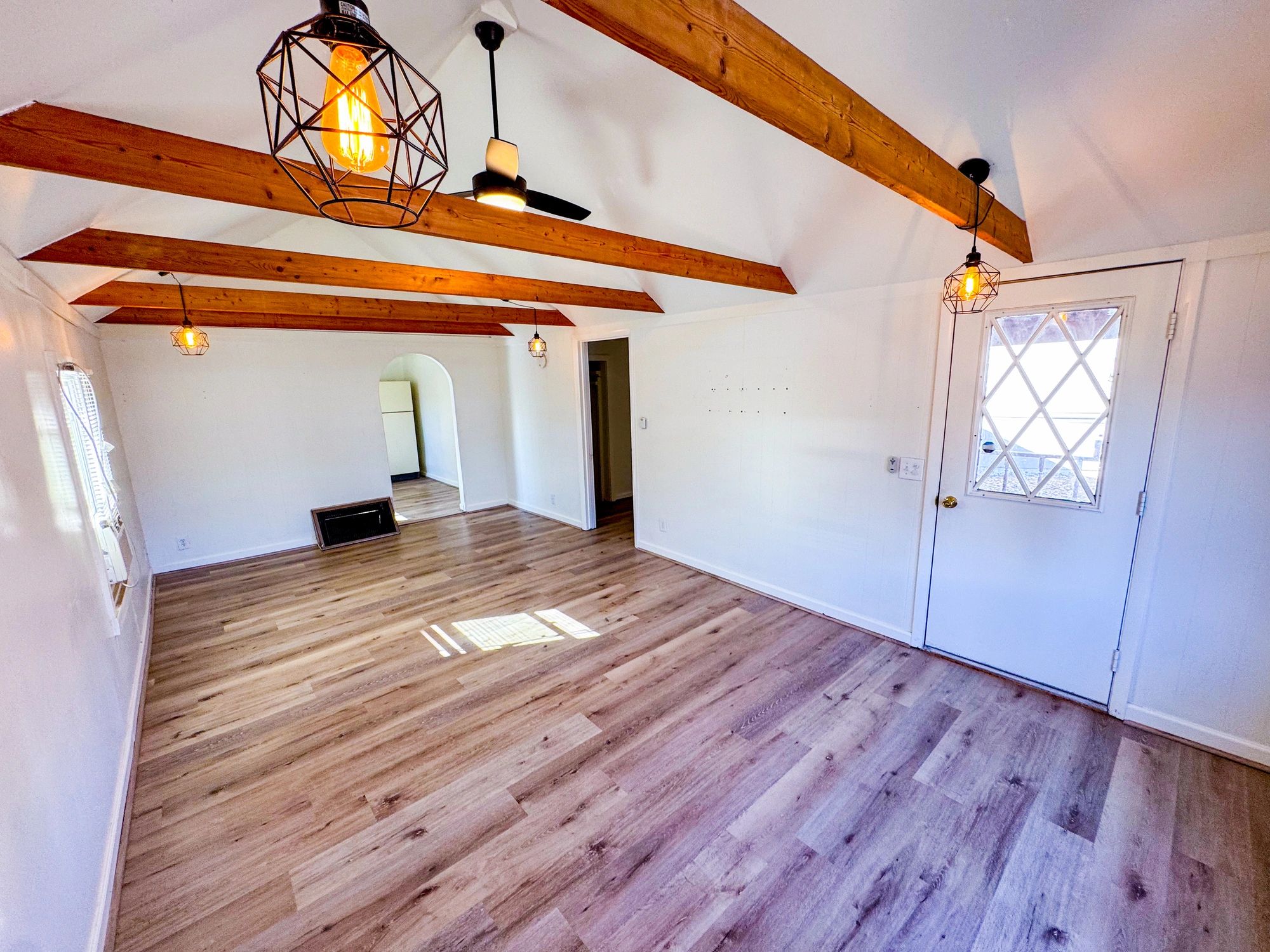 Bright residential living room showing clean finished interior details